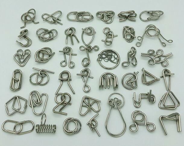 Nuevo juego de 30/41/46 piezas de Metal rompecabezas mente cerebro Teaser anillos de alambre mágico rompecabezas juguetes de juego para los niños de los adultos